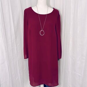 Burgundy mini shift dress. Slight bell sleeve; fully lined.